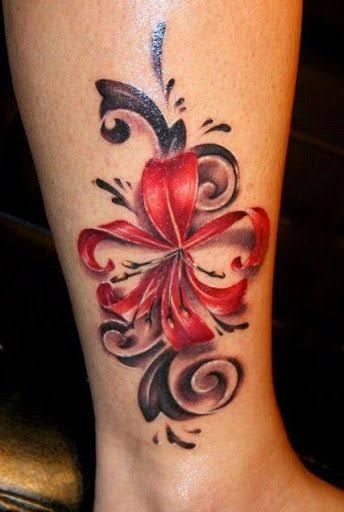 tatuagem canela feminina flor colorida